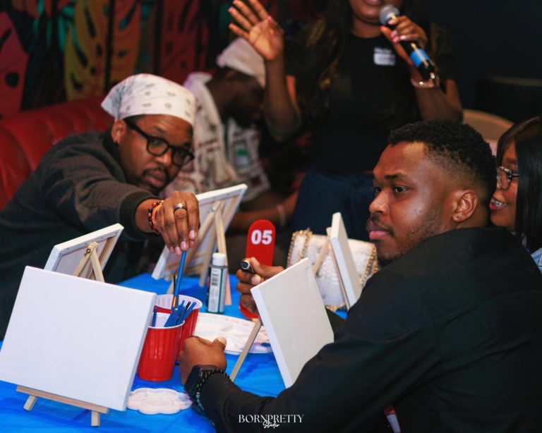 Guests painting on mini canvases at a paint and sip night